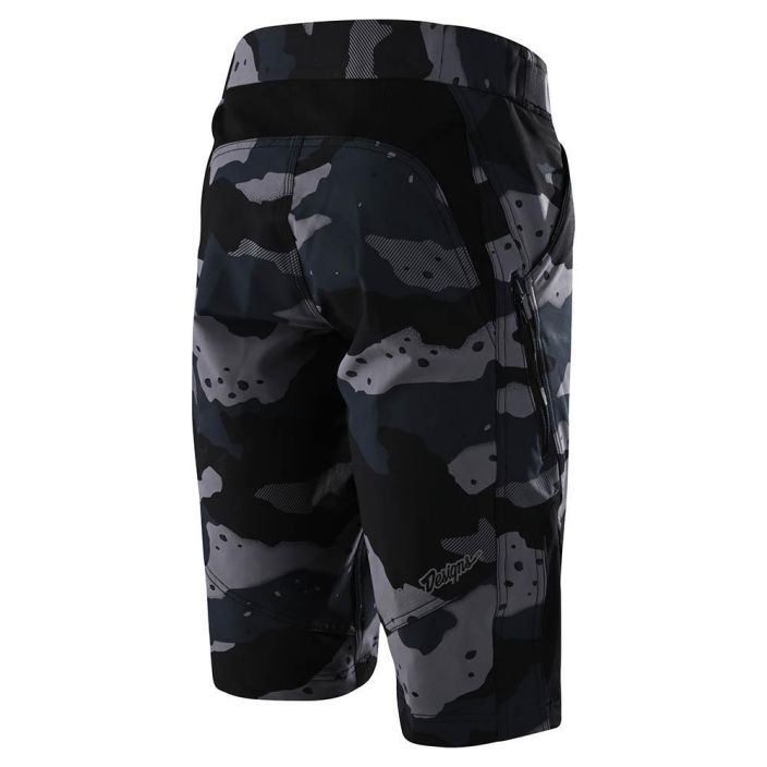 Troy Lee Design Ruckus Short Camo Gray MTB-ajoshortsit erillisella pehmustetulla sisahousulla. Vetoketjutasku Tuuletusaukko